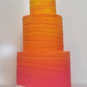 Custom tall layered cake by Seattle Bakeshop, serves 12-15 people.